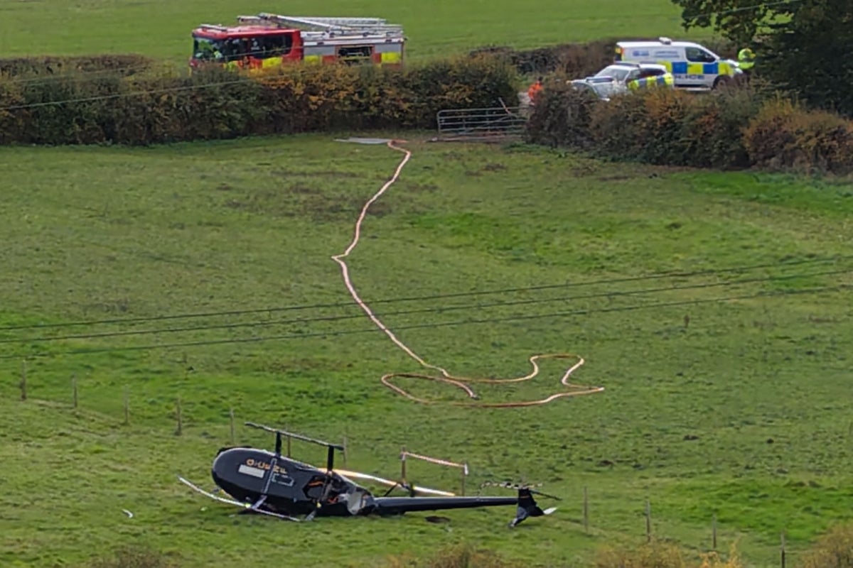 Man, 70, dies and multiple people injured after helicopter crash