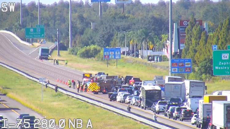 Deadly motorcycle, dump truck crash shuts down all lanes of I-75 S in ...