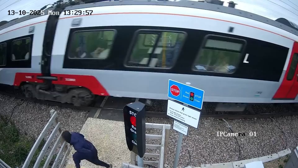 Shocking CCTV shows teen 'playing chicken' with high-speed train at ...