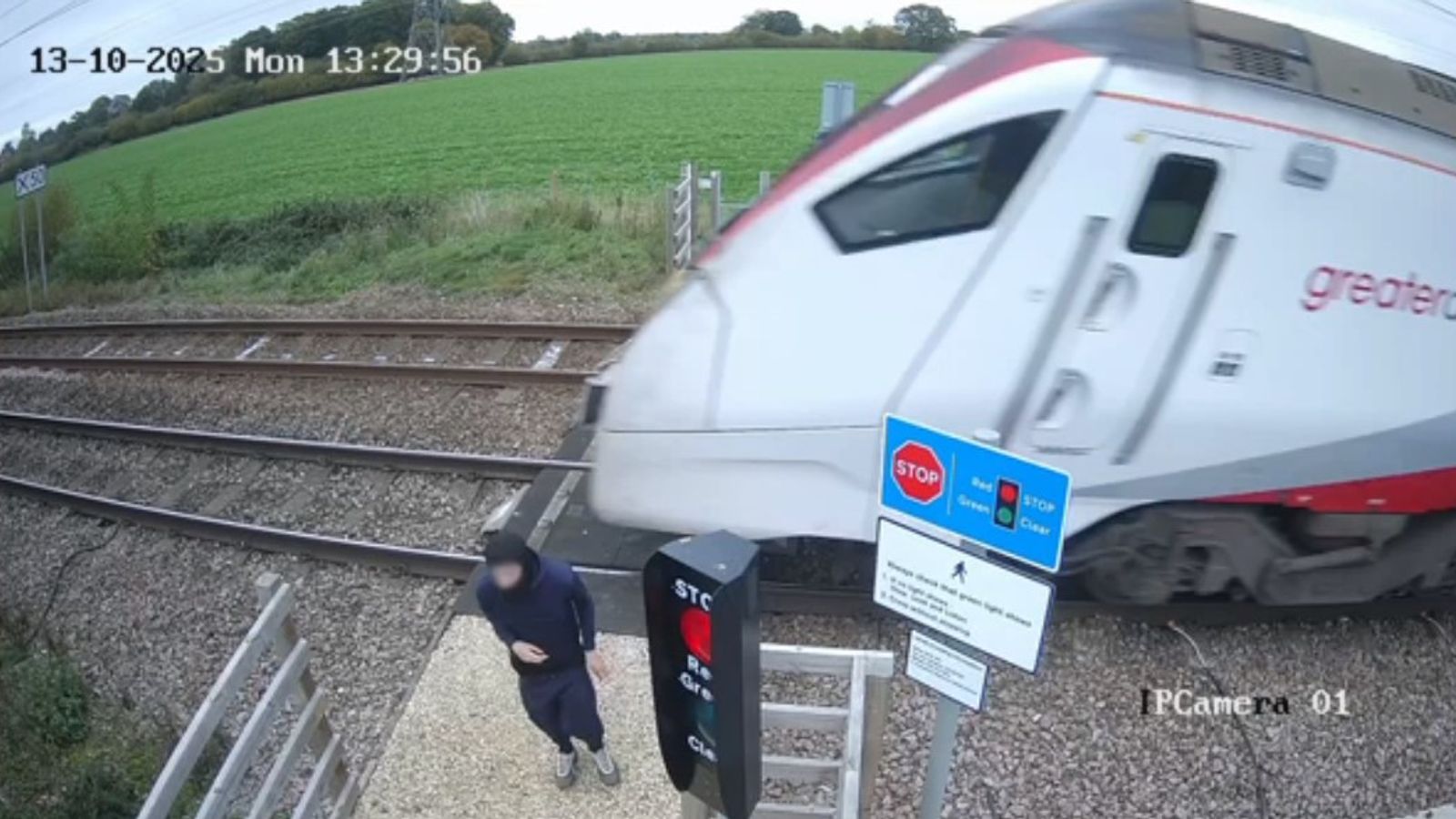 Pedestrian's near miss at level crossing