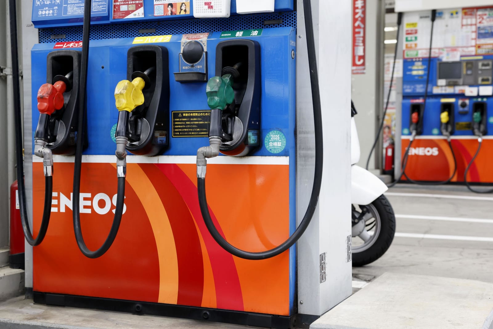 Japan ruling, opposition parties agree to scrap gasoline tax surcharge