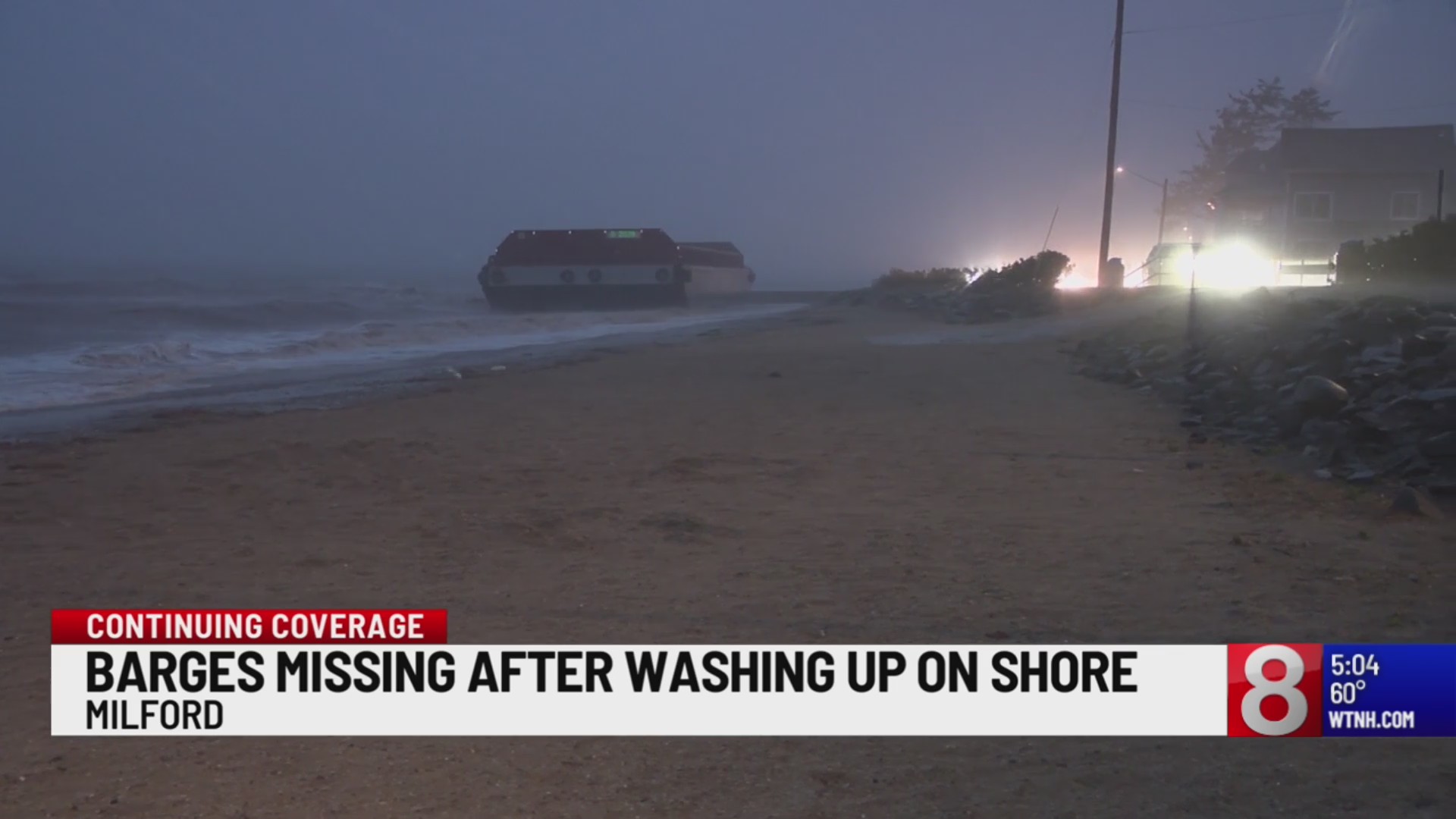 Barges wash up onto beach in Milford
