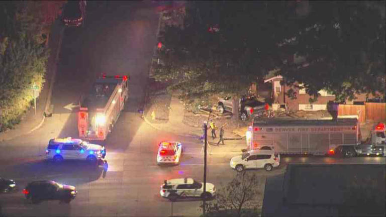 Car crashes into side of Denver home Friday morning
