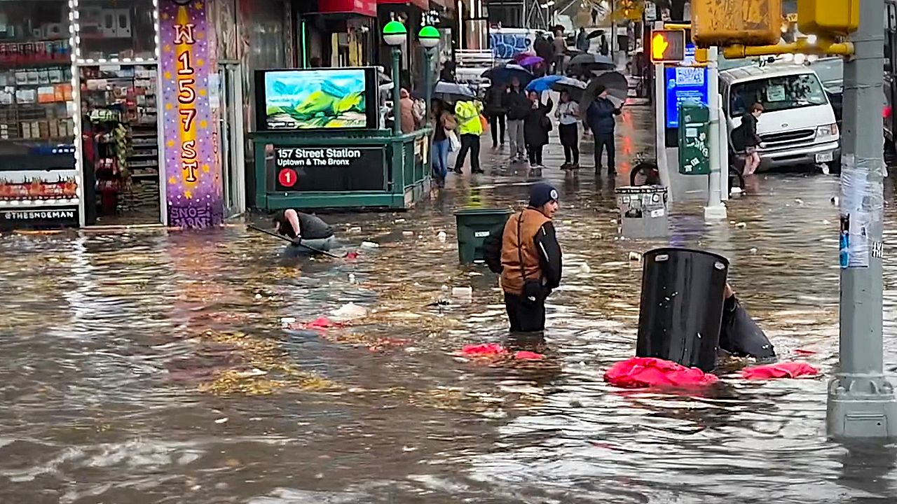 Two dead in basements as flash floods hit New York City