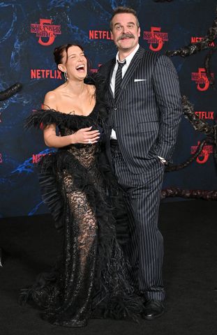 Millie Bobby Brown and David Harbour’s absences addressed at “Stranger