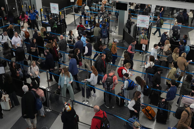 More than 1,000 flights cancelled as shutdown cuts kick in