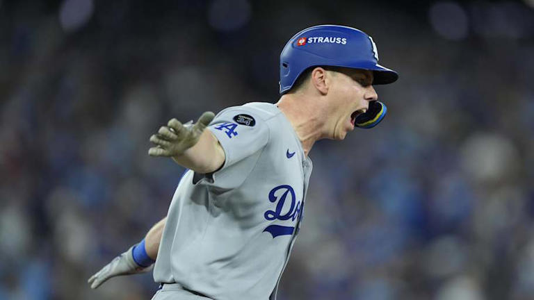 Nov 1, 2025; Toronto, Ontario, CAN; Los Angeles Dodgers catcher Will Smith (16) celebrates after hitting a home run against the Toronto Blue Jays in the 11th inning during game seven of the 2025 MLB World Series at Rogers Centre. | John E. Sokolowski-Imagn Images