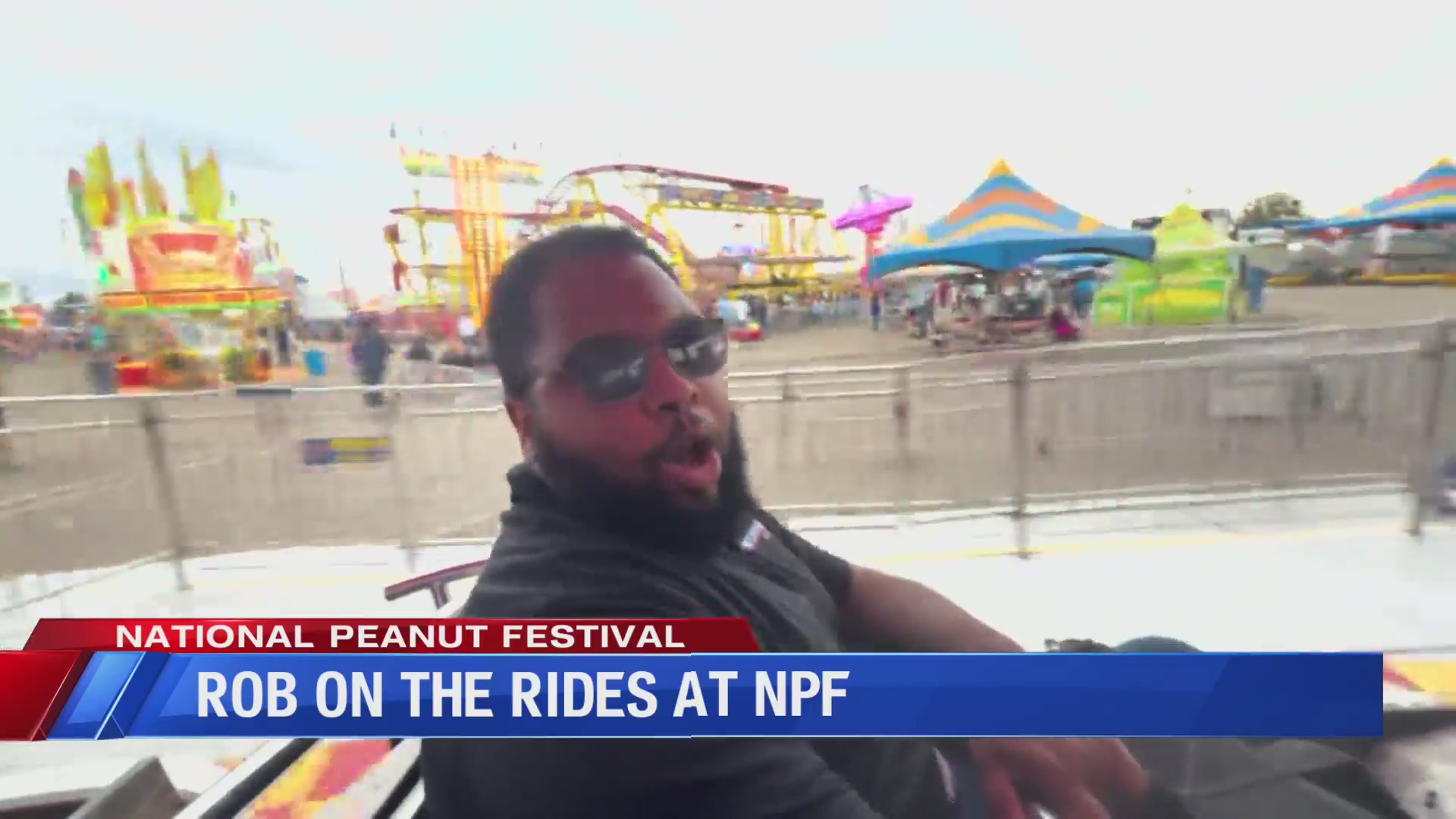 ROBERT SMITH RIDES THE RIDES AT THE NATIONAL PEANUT FESTIVAL