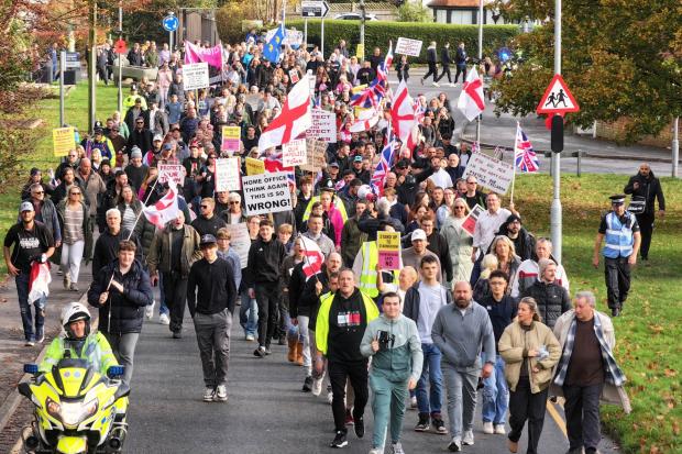 Community protests against plans for asylum seekers to be housed at camp
