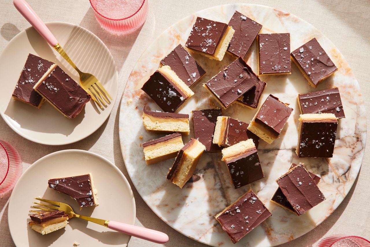Squares of millionaire shortbread on plate