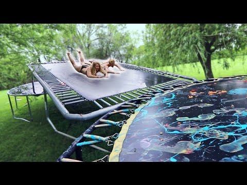 Insane Trampoline Slip ’n Slide in the Rain Fun