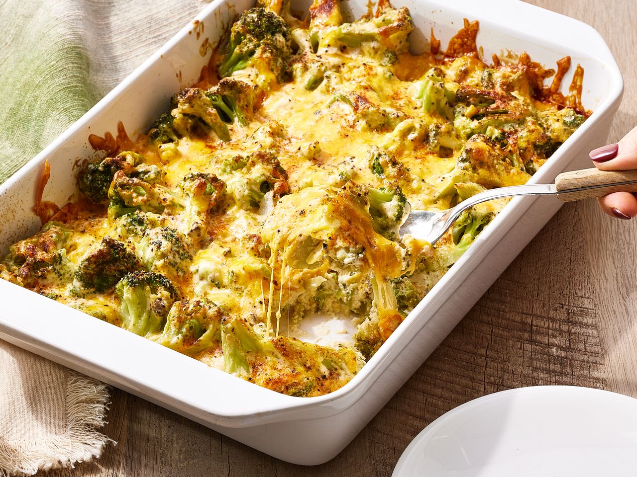 Awesome Broccoli and Cheese casserole being served.