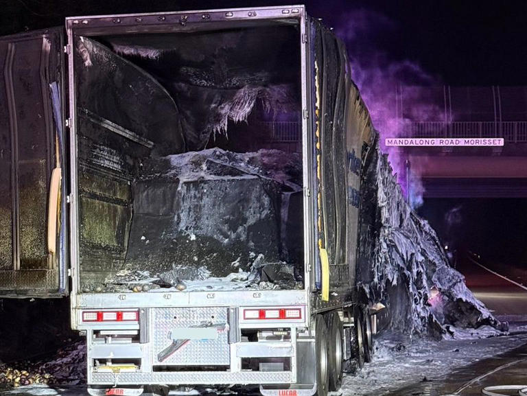 Motorway shut after truck bursts into flames