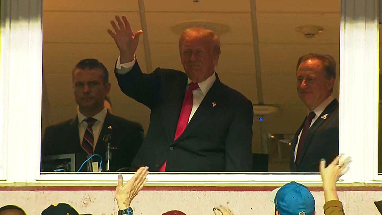 Trump greeted with mix of boos and cheers at NFL game in Washington