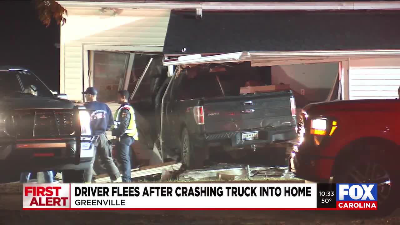 Driver flees after crashing truck into Greenville home, officials say