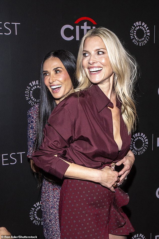 Demi Moore showed off her ageless beauty as she larked around with co-star Ali Larter at the premiere of Landman season two on Sunday in New York City