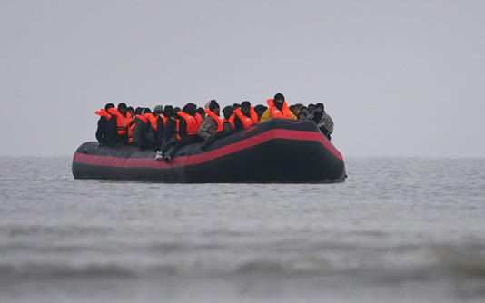 People believed to be migrants aboard a small boat heading to the UK from France (Picture: Gareth Fuller/PA Wire)