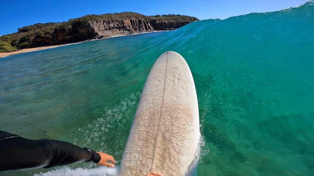 Longboard ride through stunning tropical scenery