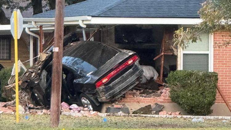 Two injured after car crashes into home in Temple