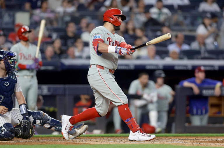 NEW YORK, NEW YORK – JULY 25: Kyle Schwarber #12 of the Philadelphia Phillies follows through on his fifth inning two run home run against the New York Yankees at Yankee Stadium on July 25, 2025 in New York City. The hit is Schwarber’s 1,000th in the major leagues. (Photo by Jim McIsaac/Getty Images)