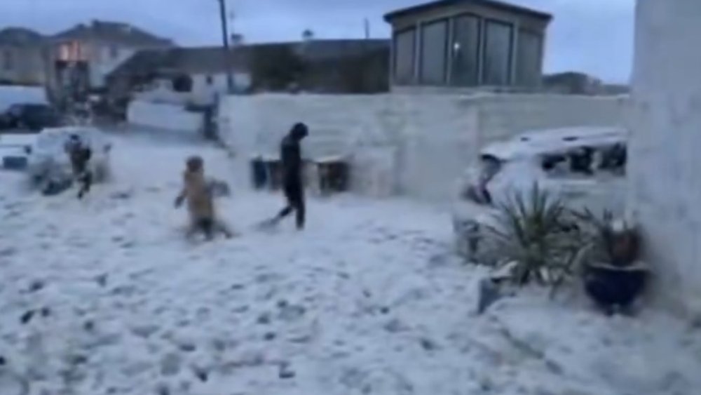Huge sea foam engulfs roads and houses
