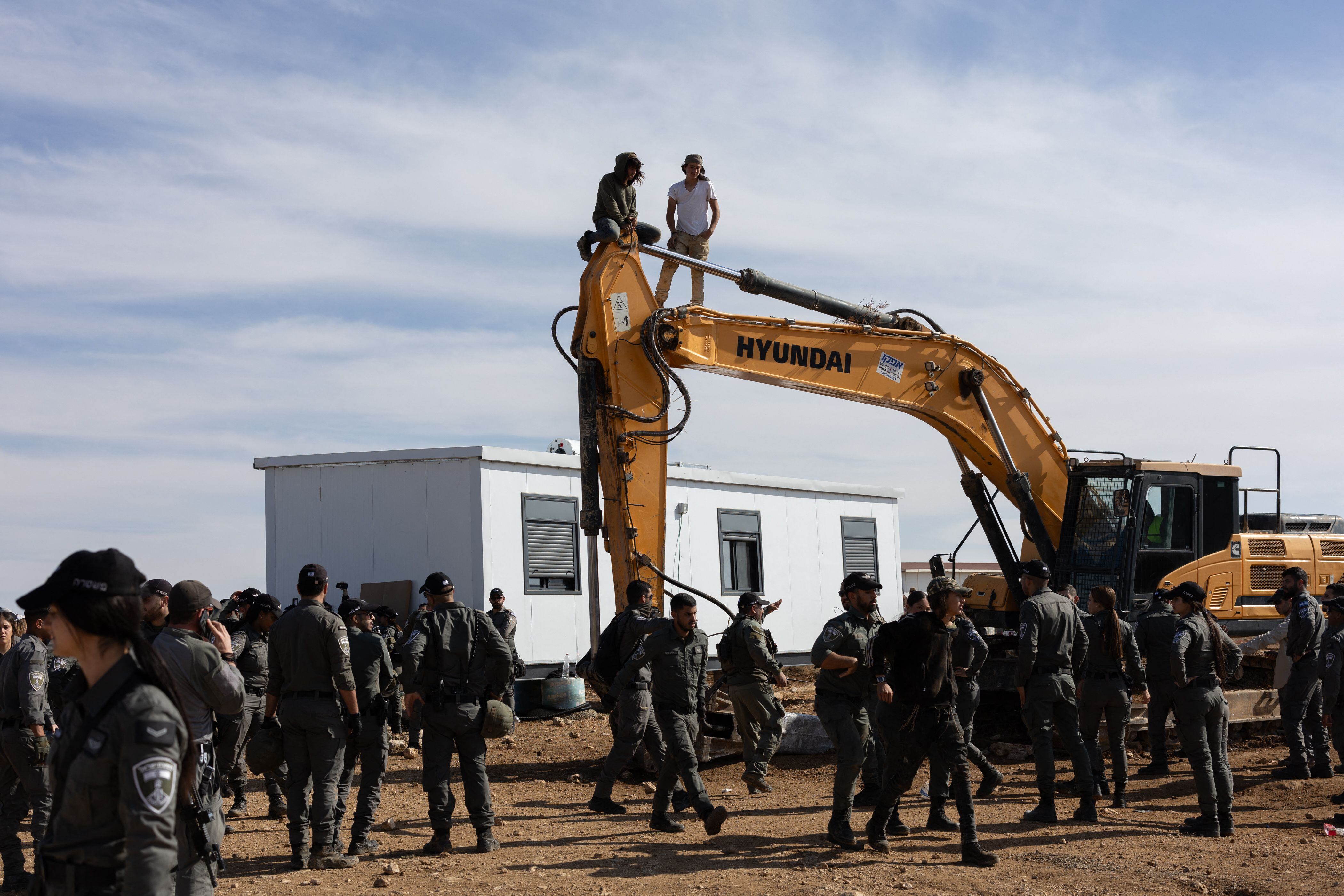 Settlers spark West Bank bulldozer brawl as Israeli outpost is demolished
