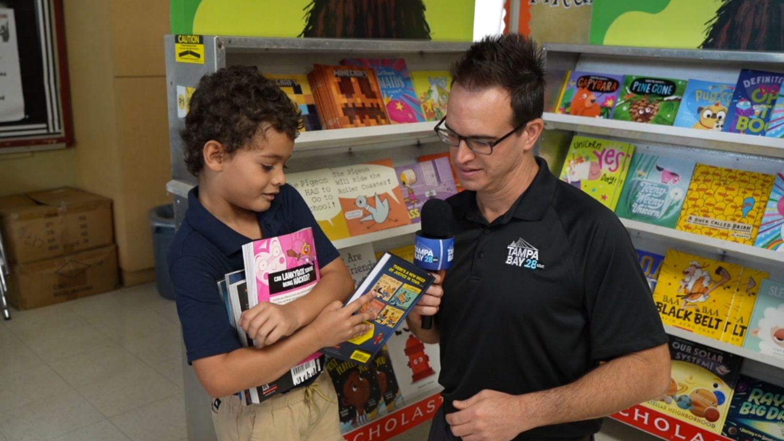 Students at Legacy Preparatory Academy receive free books as part of ...