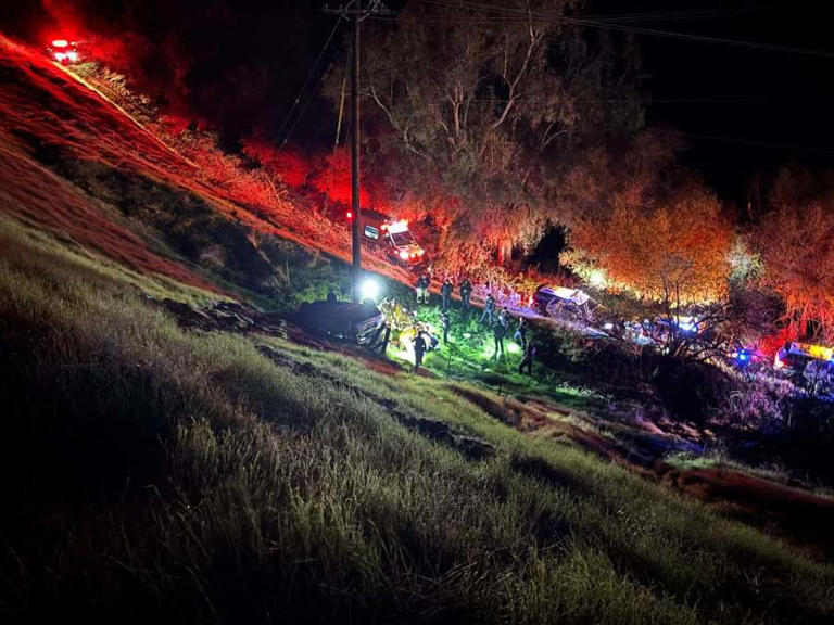 Driver survives after Jeep rolls down steep Fresno embankment