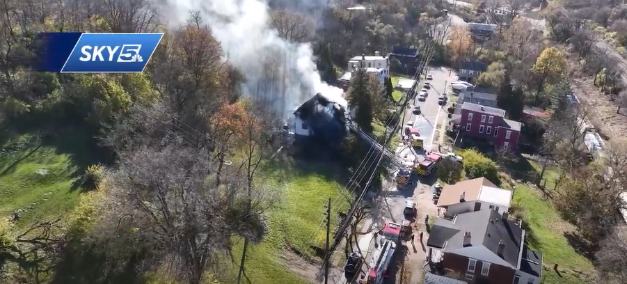 Crews battle large house fire in Newport; smoke plume visible from ...
