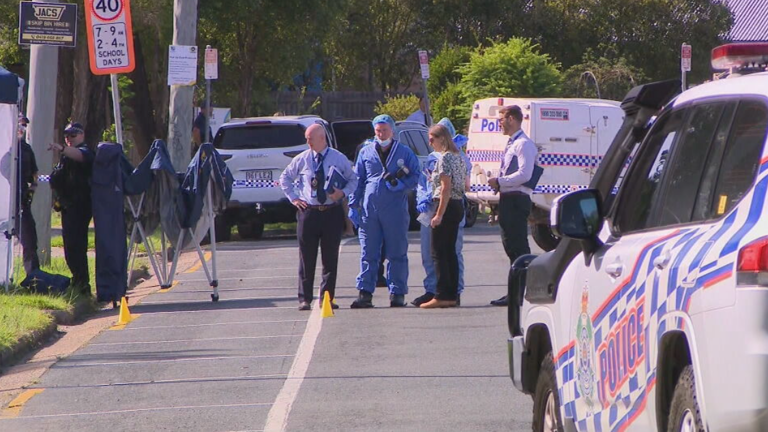 Man shot dead by police was holding knife to woman's throat