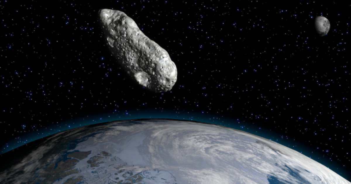 Artwork of an asteroid and planet Earth (Representative Image Source: Getty | JUAN GARTNER)