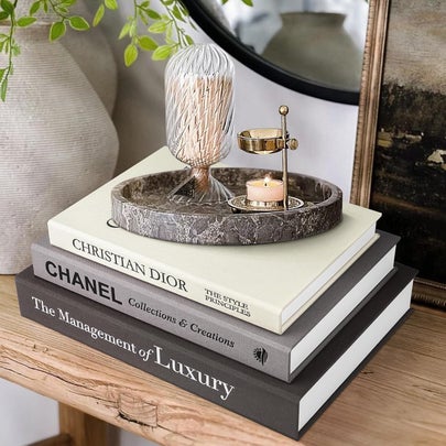 This set of storage boxes that look like high-end coffee table books