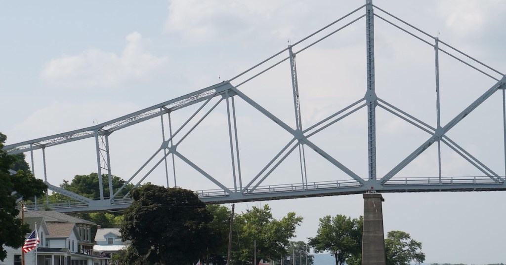 The Black Hawk Bridge descends into Lansing, Iowa. It spans the Mississippi River between Iowa and Wisconsin.