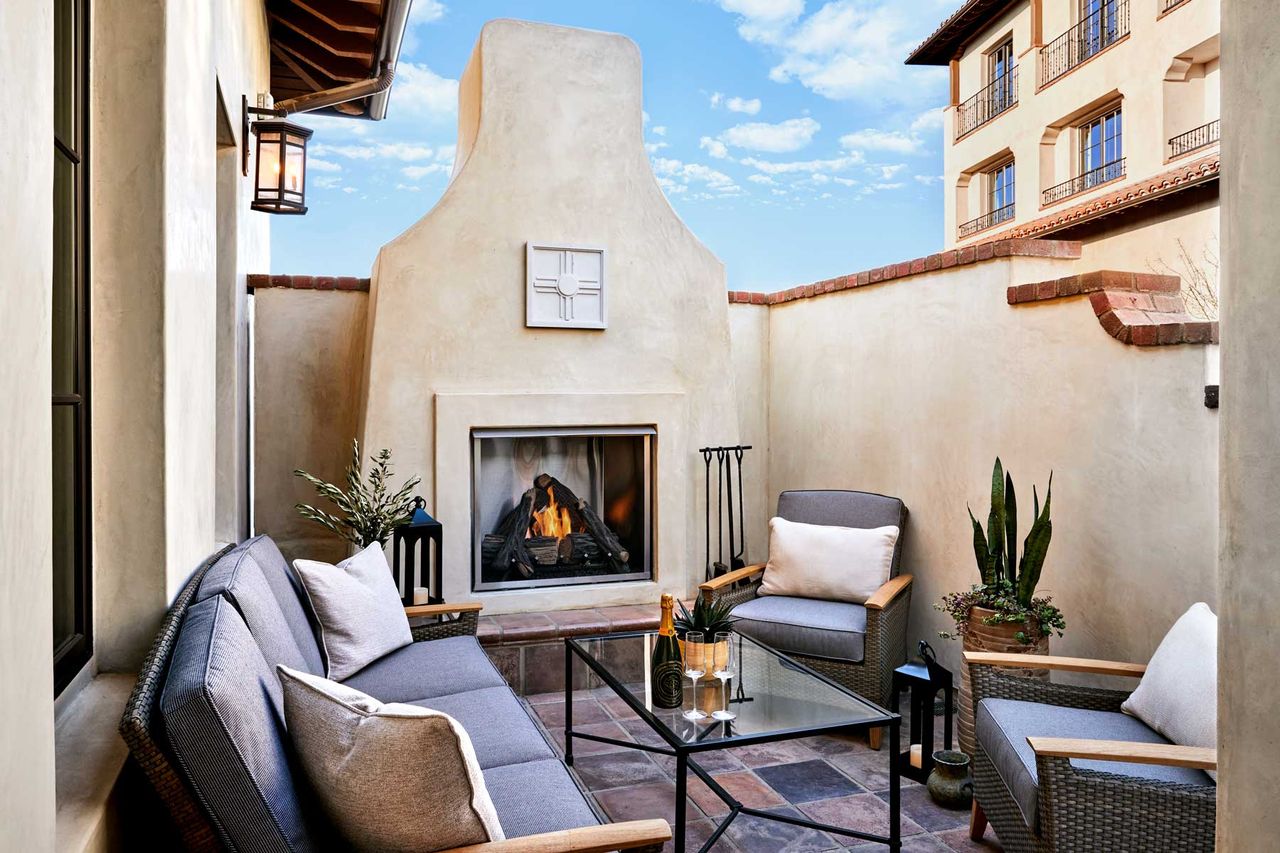 Patio fireplace and seating at Inn at the Mission San Juan Capistrano
