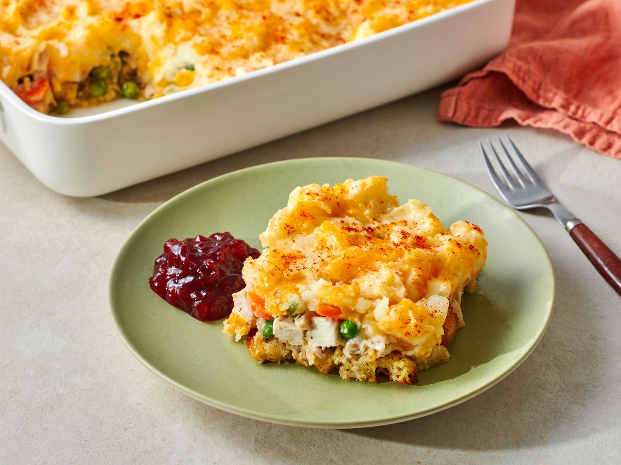 Thanksgiving leftovers casserole served on a plate.