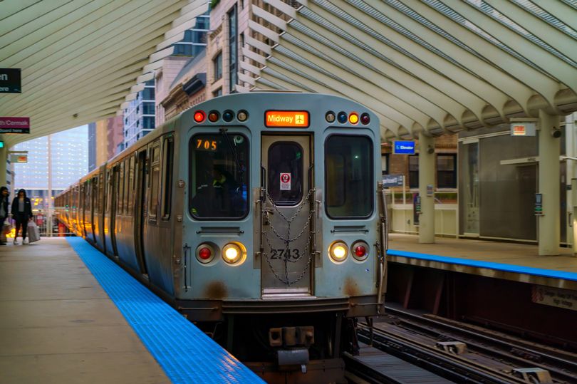 Woman, 26, 'set on fire by man' while riding Chicago train as suspect ...