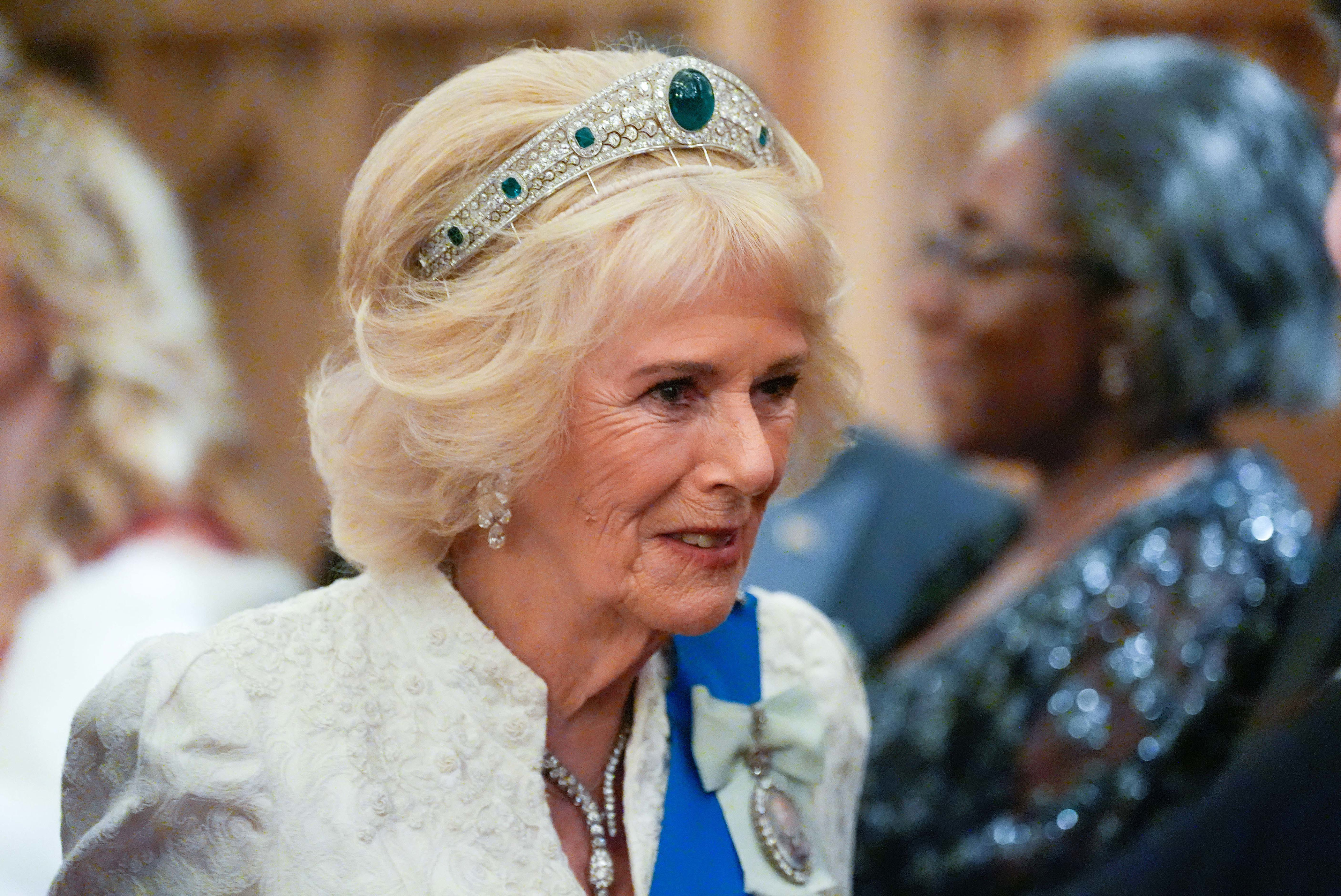Queen Camilla wears historic emerald tiara to Windsor Castle gala as ...
