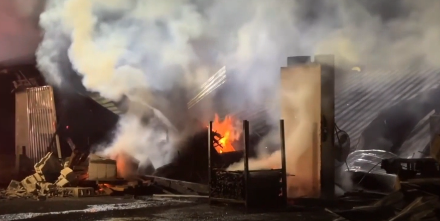 WATCH: Fire rips through lumber yard