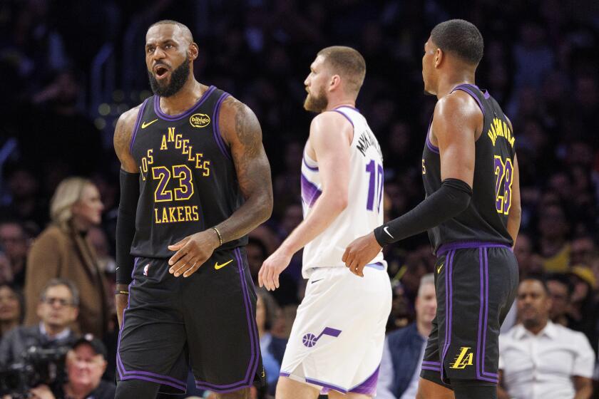LeBron James returns and hands out 12 assists as Lakers defeat the Jazz