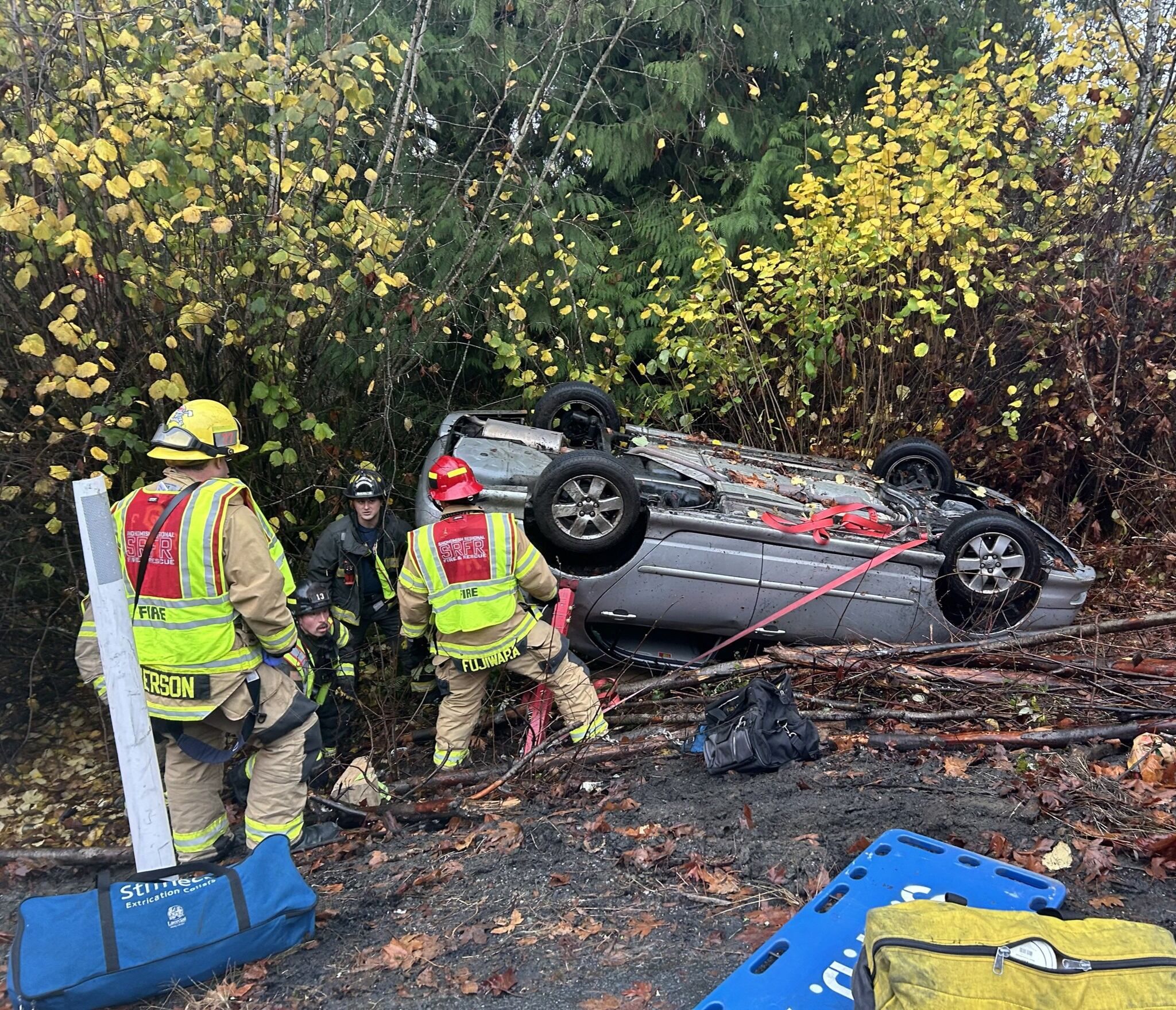 Firefighters free trapped driver after rollover crash near Snohomish