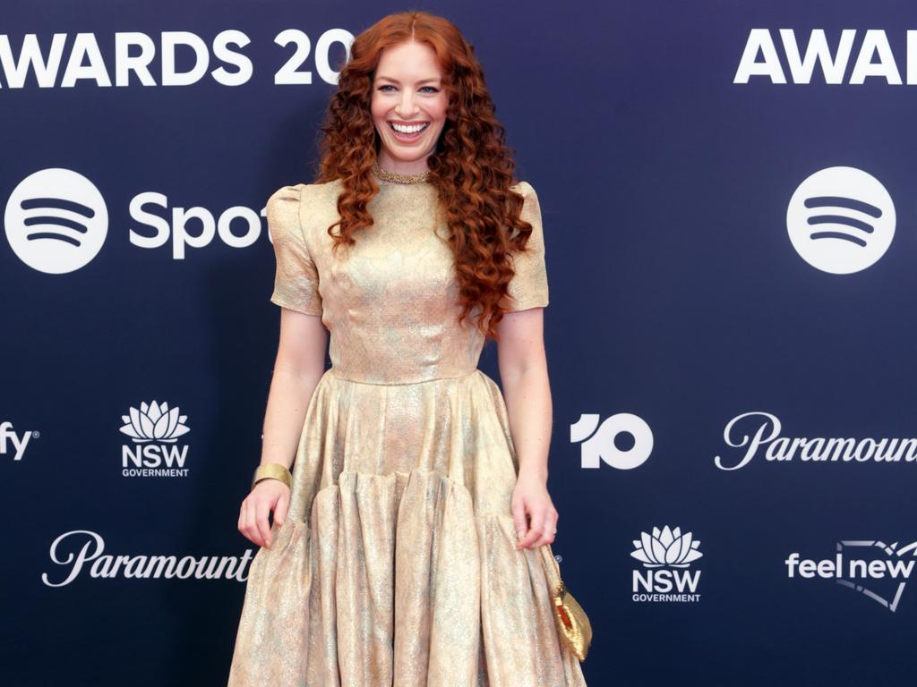 Aussie rocker holds back tears amid milestone