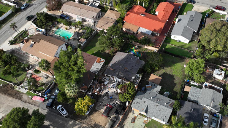 House explosion caused by child turning on lamp during a gas leak ...