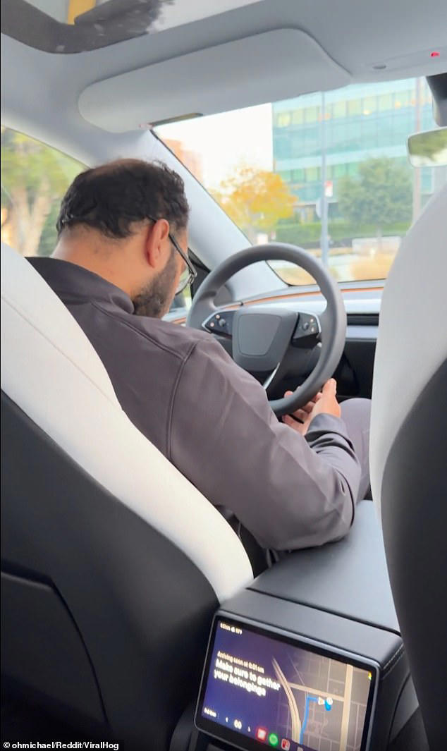 My Tesla taxi driver was SLEEPING at the wheel as we whizzed through ...