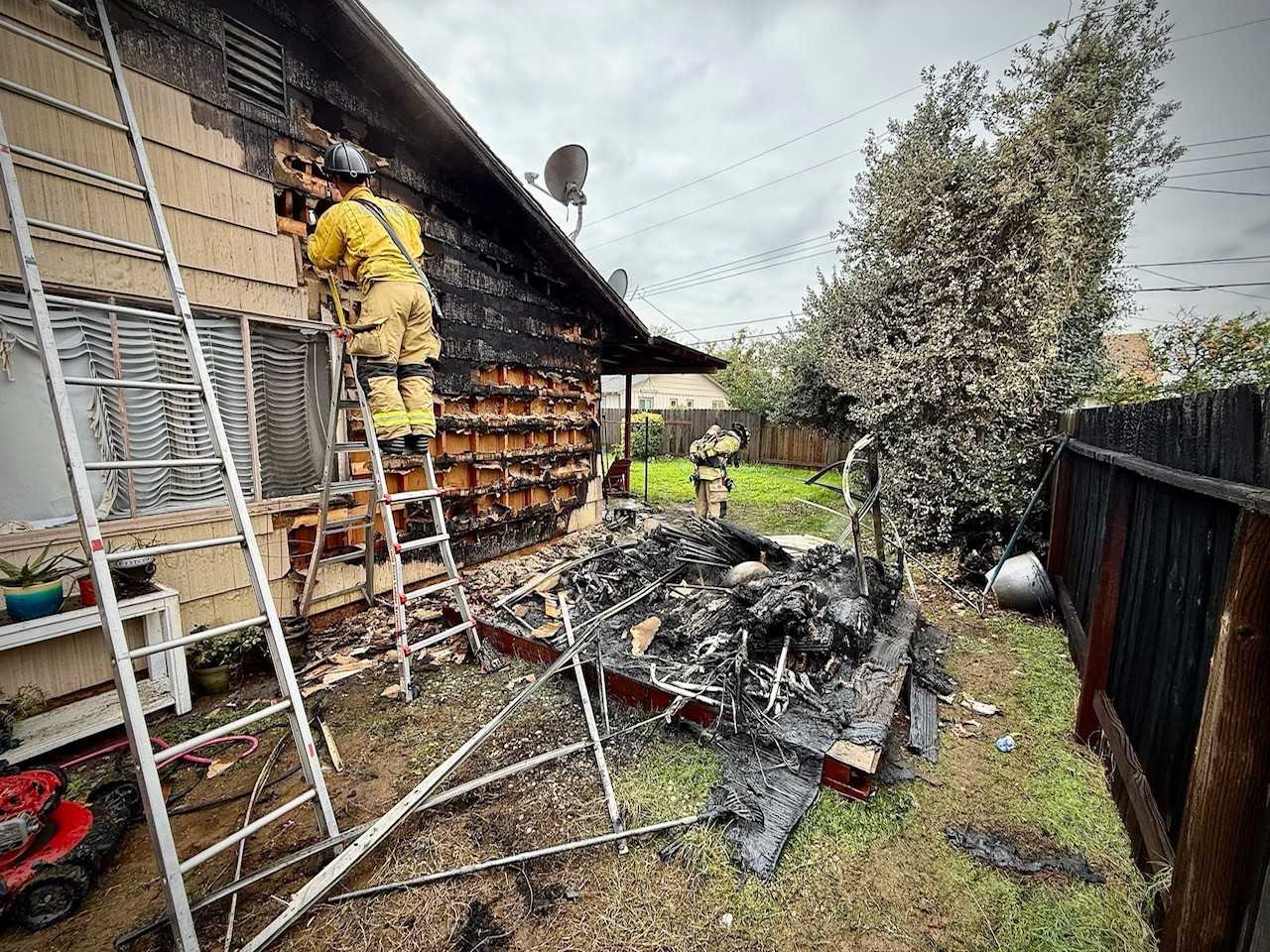 Mom hailed as hero for saving man from burning home