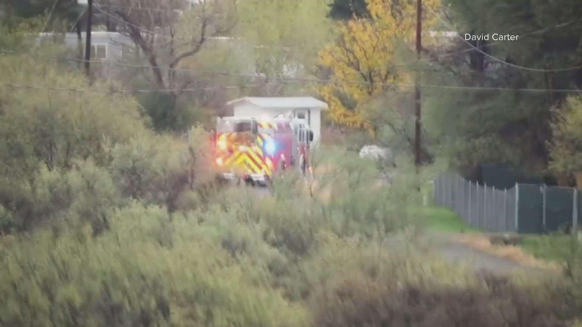 Search underway for man swept away in flooding