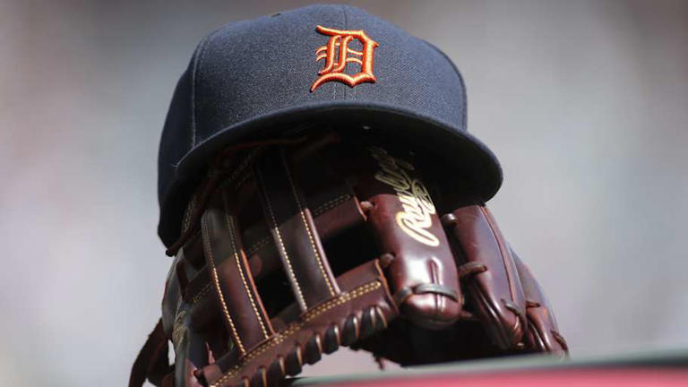 Jun 1, 2019; Atlanta, GA, USA; Detroit Tigers hat and glove are seen in the dugout before a game against the Atlanta Braves at SunTrust Park. | Brett Davis-Imagn Images
