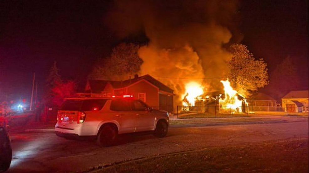 Garage fire in Burton spreads to two homes