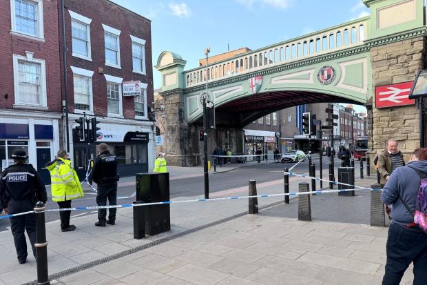 Woman suffers serious injuries after being hit by bus in city centre
