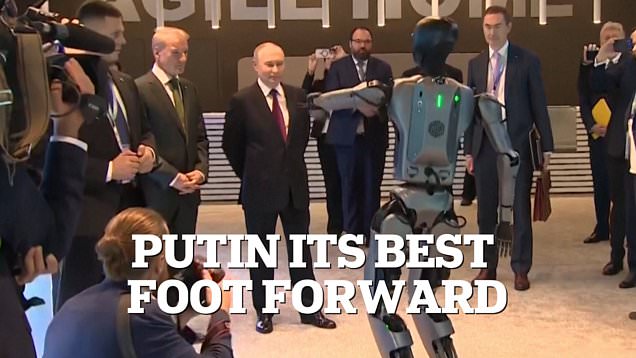 Awkward moment Vladimir Putin is forced to watch dancing AI robot