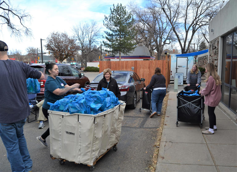 McBackpack volunteers providing food bags for more than 500 PSD ...
